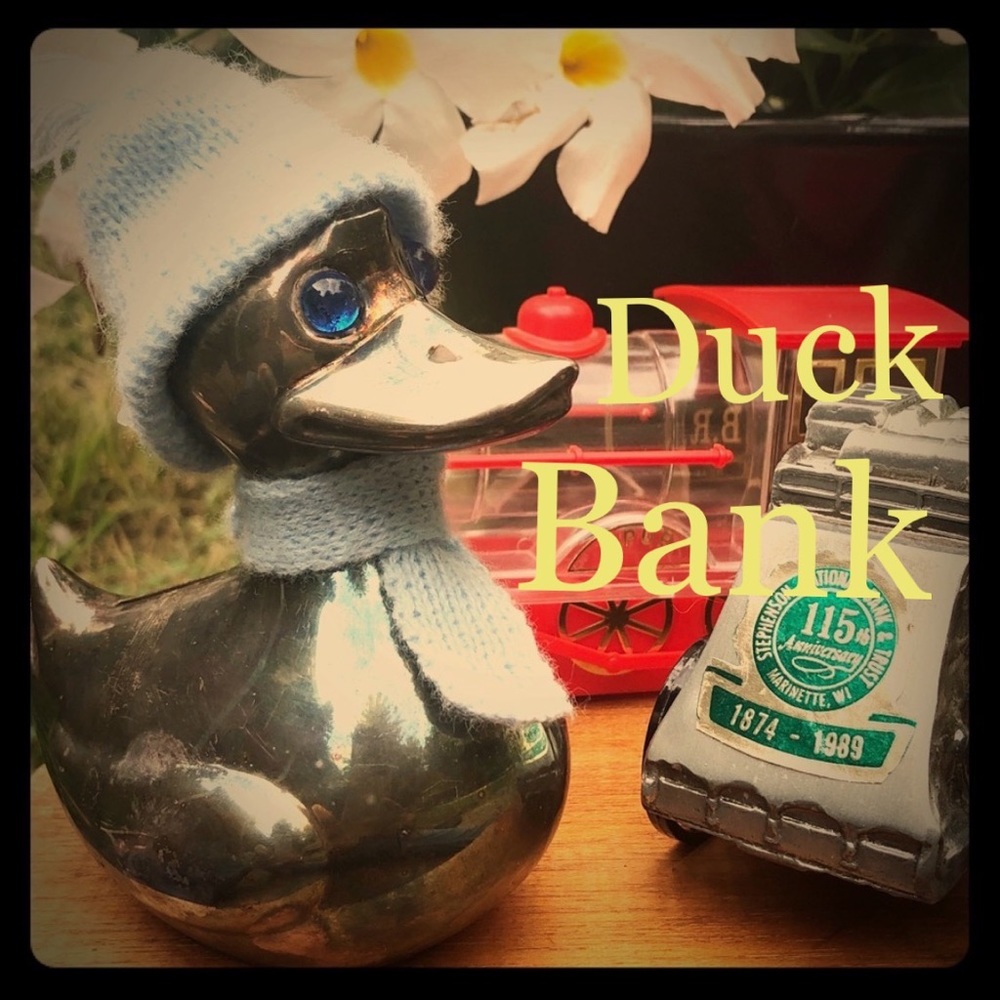 Vintage Silver Plate Duck Bank with blue gem eyes wearing a scarf and hat
